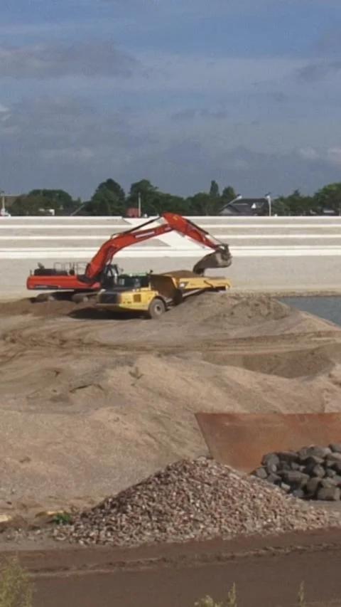 Vertical - Construction works excavating Room for the river Waal 2015 Stock Footage 308463210