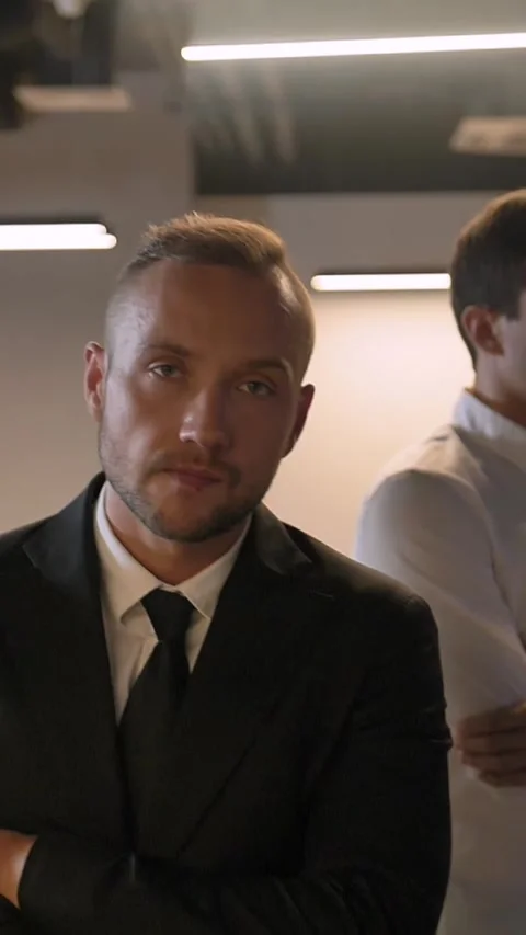 Vertical of Cool Epic shot of three confident attractive handsome business Stock Footage 277275461