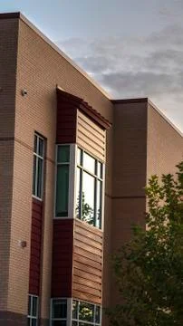 Vertical Corner of modern two storey building near sunset 스톡 사진