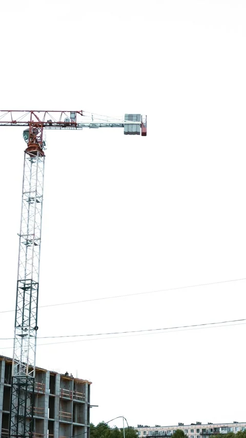Vertical of Cranes are operating on comstruction. Stock Footage 305459570