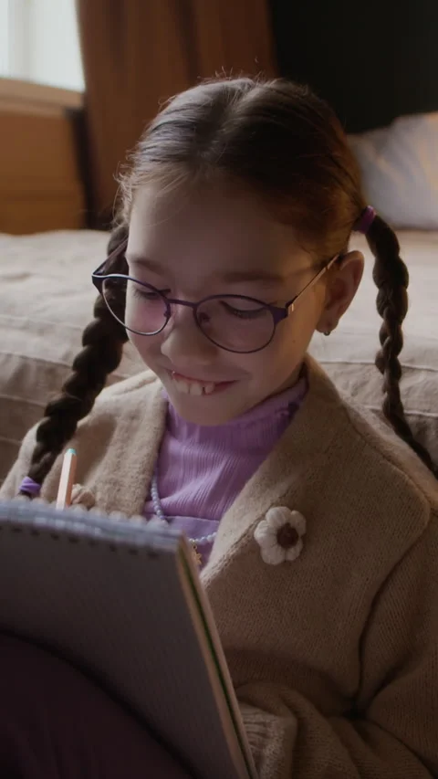 Vertical of Creative Student Girl Studying with Enthusiasm at Home Video stock 326664546