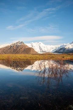 Vertical crop Icelandic mountain range with beautiful snowcapped mountains Stock Photos