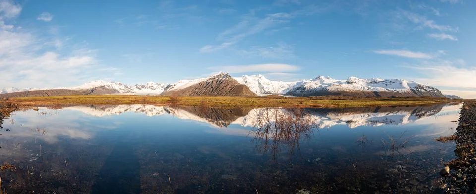 Vertical crop Icelandic mountain range with beautiful snowcapped mountains Stock Photos