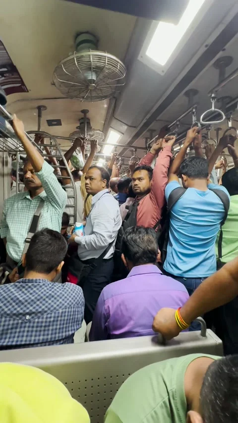 Vertical : Crowds of people sitting in a local Mumbai train. 4K Stock Footage 237158675