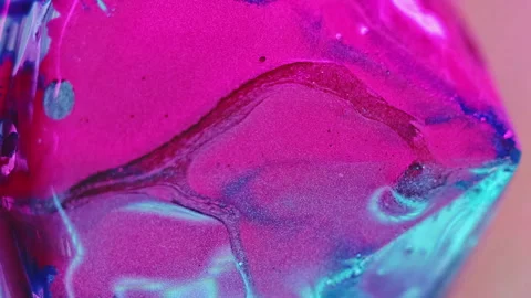 Vertical crystal gem glitter ink spill pink blue Vídeos de archivo 283288679