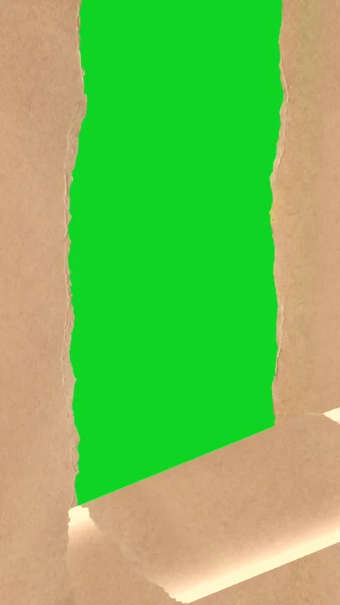 Vertical curled brown craft paper peeling down revealing animated on green Stock Footage 335216758