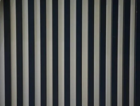 Vertical dark and light striped wall paneling background pattern Stock Photos