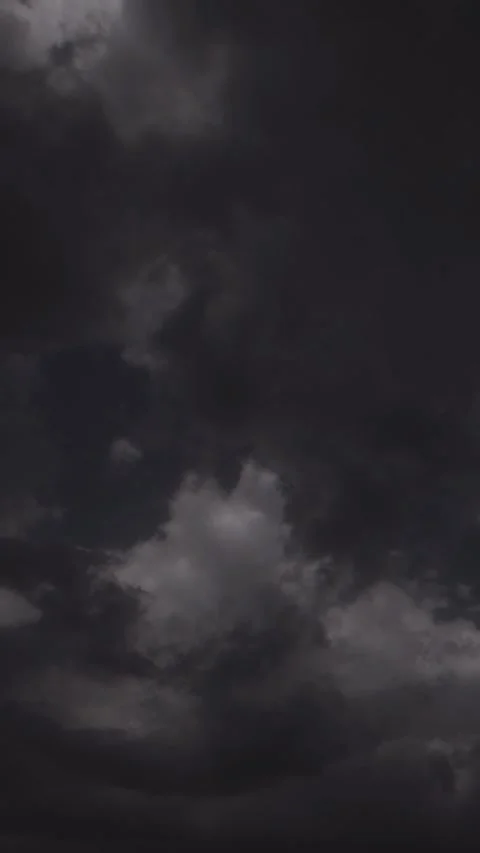 Vertical dark stormy clouds moving in night sky Stock Footage 337606788
