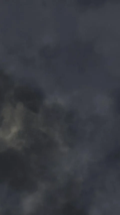Vertical dark stormy clouds moving in night sky Stock Footage 337608961