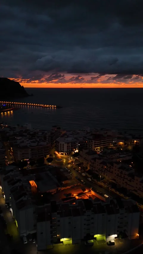 Vertical Dawn Aerial of Puerto de Javea with Illuminated Buildings Видео 337405136