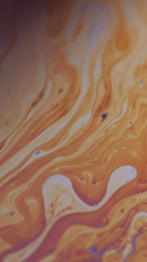 Vertical defocused acid fluid ink blend orange dye Stock Footage 312101427