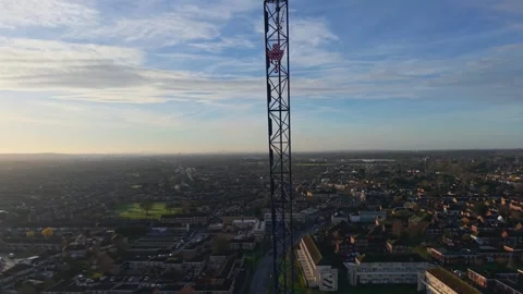Vertical Descending Drone Shot in Front of Construction Crane Revealing Hook Stock Footage 324691450