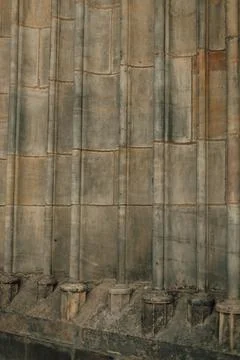 Vertical design and texture of an old building with columns Stock Photos