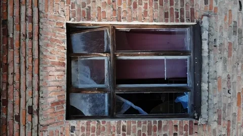Vertical destroyed school and broken windows in the building Stock Footage 246959417