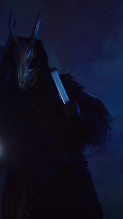 Vertical, The devil monster dances with RGB sticks in his hands. Stock Footage 301543710