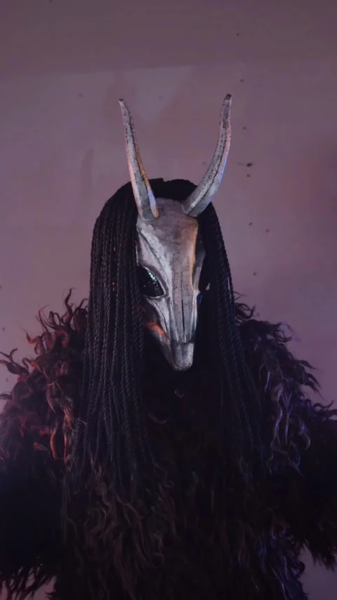 Vertical, The devil monster dances with RGB sticks in his hands. Stock Footage 301543790