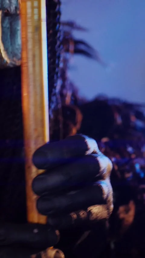 Vertical. The devil monster dances with RGB sticks in his hands. A mystical man Stock Footage 302732136