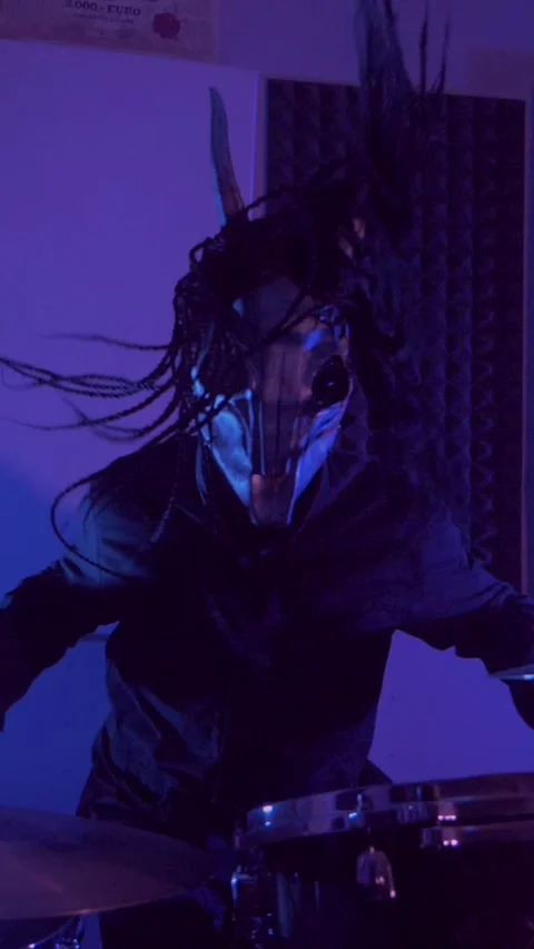 Vertical. The devil monster plays the drums. A mystical man Stock Footage 302192204