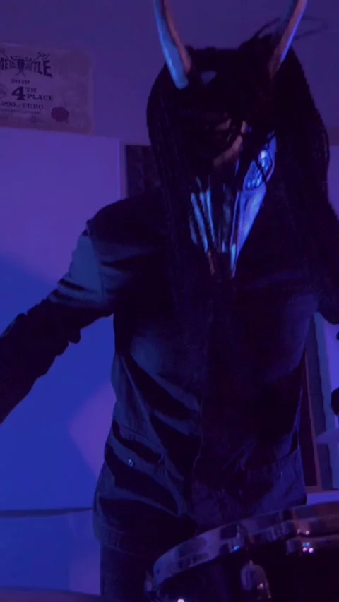 Vertical. The devil monster plays the drums. A mystical man Stock Footage 302192316