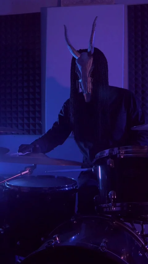 Vertical. The devil monster plays the drums. A mystical man Stock Footage 302192482