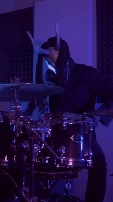 Vertical. The devil monster plays the drums. A mystical man Stock Footage 302192540