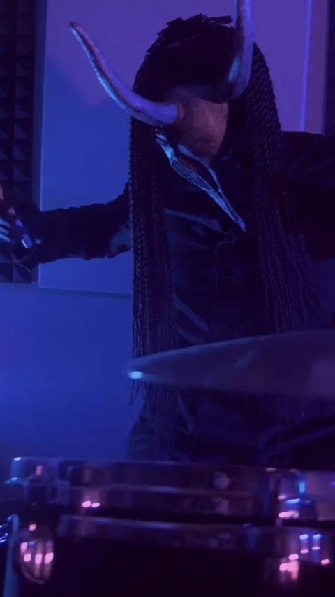 Vertical. The devil monster plays the drums. A mystical man Stock Footage 302192575