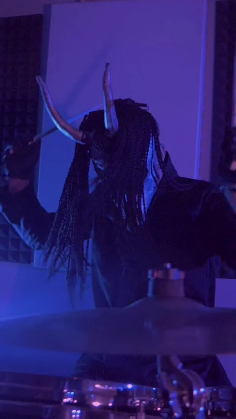 Vertical. The devil monster plays the drums. A mystical man Stock Footage 302192583