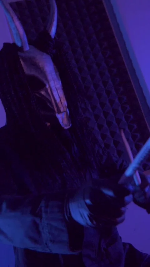 Vertical. The devil monster plays the drums. A mystical man Stock Footage 302192636