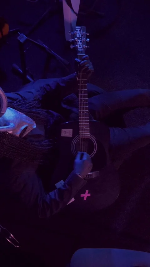 Vertical. The devil monster plays the guitar. A mystical man in a scary mask Stock Footage 302193250