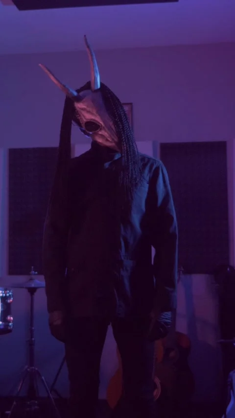 Vertical. Devil Monster Suffers, Dances, Gets Angry mystical man in a scary mask Stock Footage 302192084