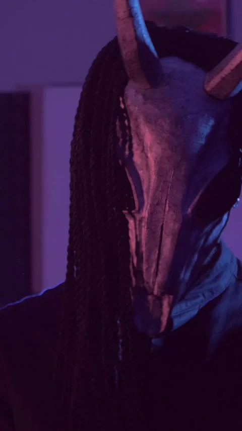 Vertical. Devil Monster Suffers, Dances, Gets Angry mystical man in a scary mask Stock Footage 302192195