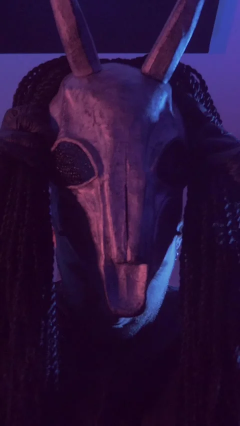 Vertical. Devil Monster Suffers, Dances, Gets Angry mystical man in a scary mask Stock Footage 302192196