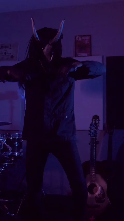 Vertical. Devil Monster Suffers, Dances, Gets Angry mystical man in a scary mask Stock Footage 302192917