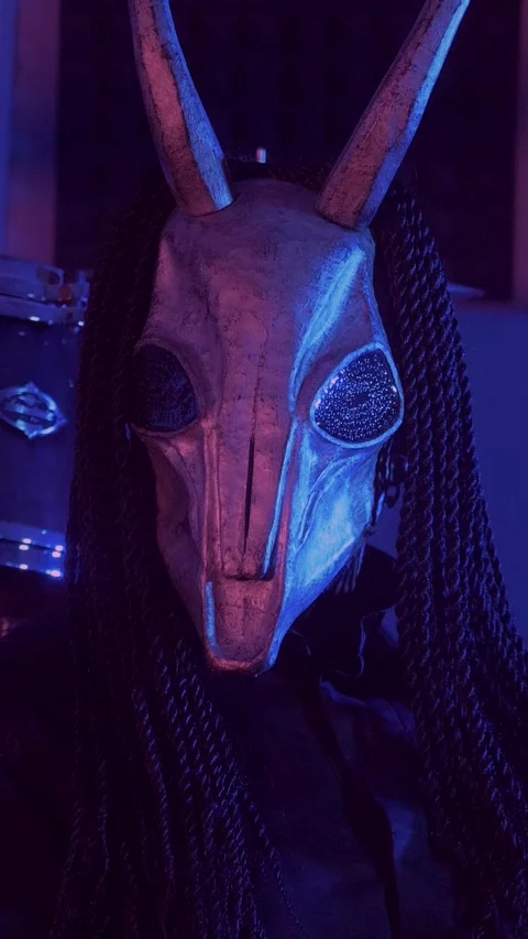 Vertical. Devil Monster Suffers, Dances, Gets Angry mystical man in a scary mask Stock Footage 302193001