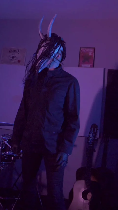 Vertical. Devil Monster Suffers, Dances, Gets Angry mystical man in a scary mask Stock Footage 302193013