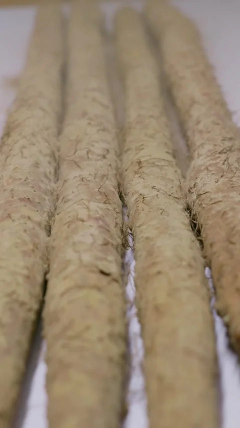 Vertical: Dirt on the Chinese yam surface is blown away. Видео 341836692