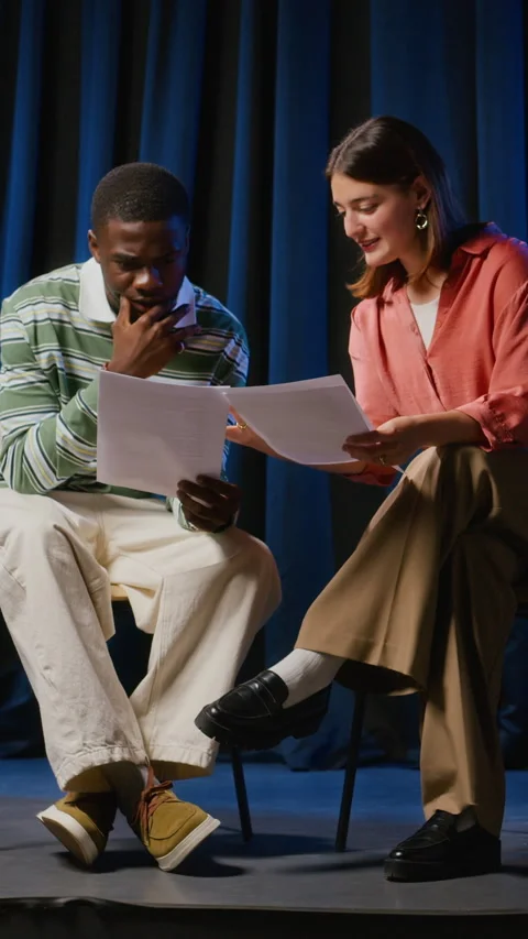 Vertical of Diverse Actors Rehearsing Script Together on Theater Stage Stock-Footage 344535271