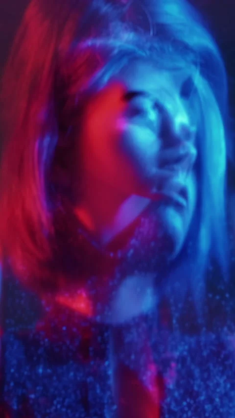 Vertical double exposure blur silhouette neon red Stockbeeldmateriaal 281214208