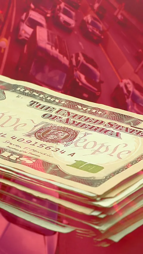 Vertical double exposure concept of dollar bill stack blended over congested Stock Footage 346076486