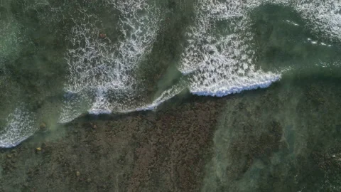 Vertical downward view of the ocean waves and surface. Clean ocean water Stock Footage 153421336