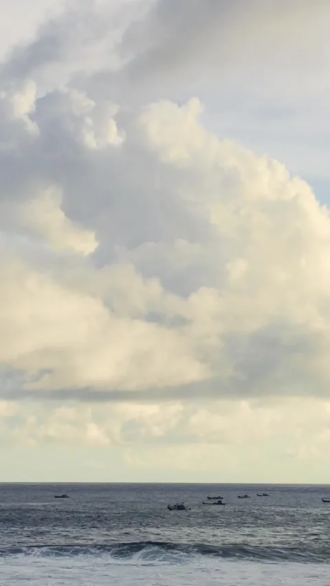 Vertical Dramatic Clouds Over Ocean Stock Footage 337527406