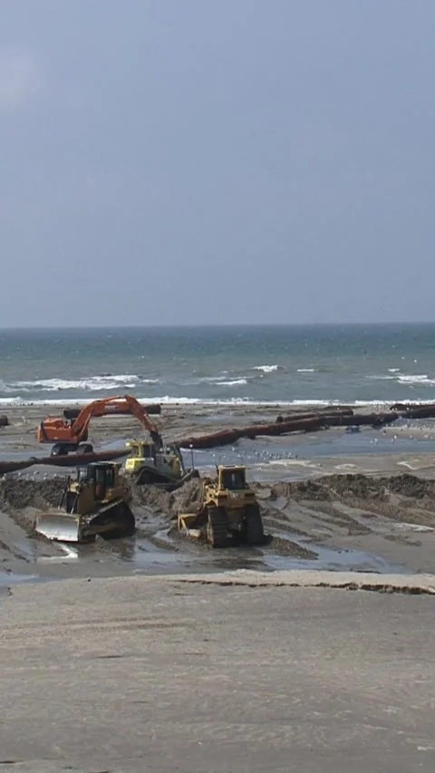 Vertical - dredging works North Sea beach Stock Footage 317174829