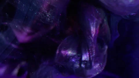 Vertical dripping glitter defocused art splash ink Video stock 333523195