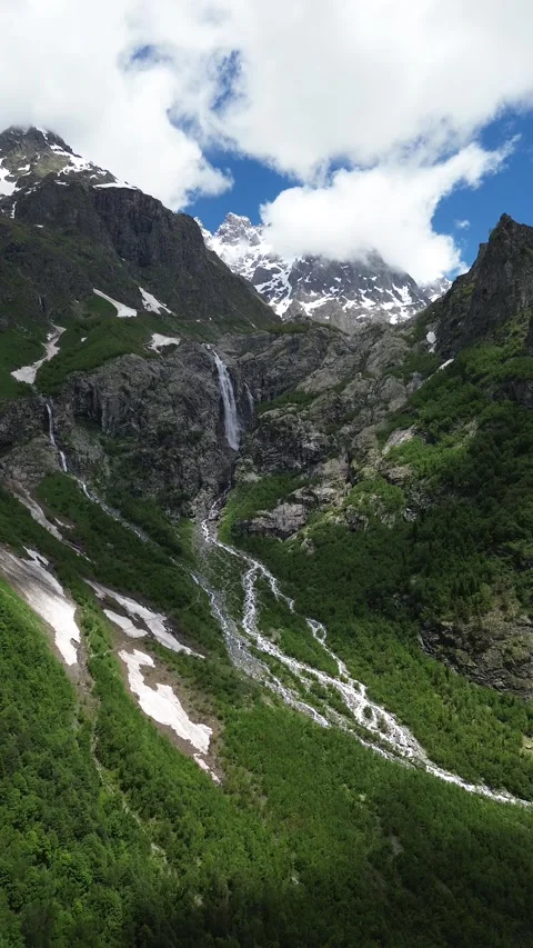 Vertical Drone Approach to Shdugra Waterfall and Mount Ushba, Georgia, 4K Stock Footage 339342119