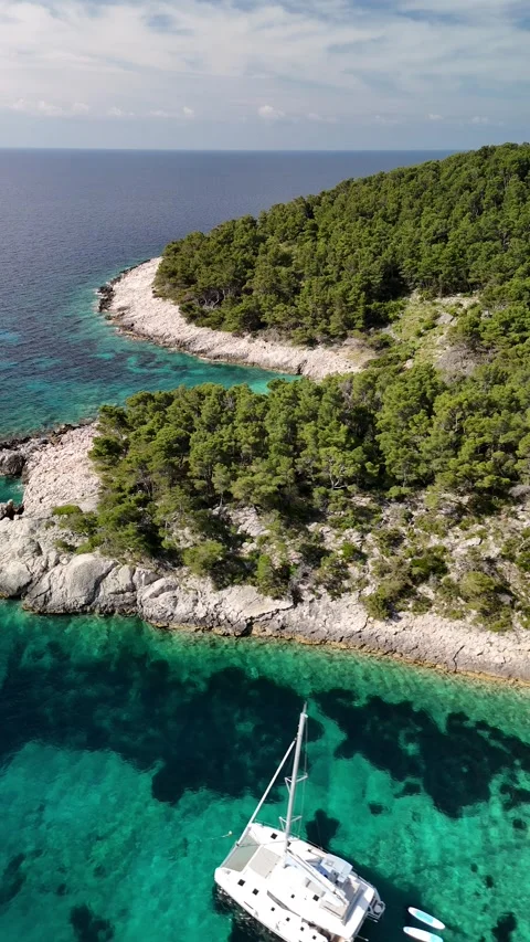 Vertical Drone: Borča Beach Flyover &amp; Semicircle, Milna, Hvar Island, Croatia Video stock 313483623