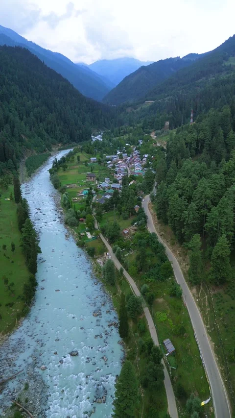 Vertical drone capturing a shepherd trail across valley edge. Stock Footage 310806623