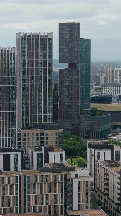 Vertical drone flight to Manhattan loft gardens towers and Stratford skyline Stock Footage 337405619