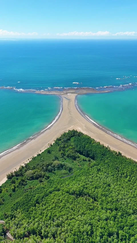 Vertical Drone Flight from Ocean Toward Whale Tail at Sunset, Uvita Vídeos de archivo 328598429