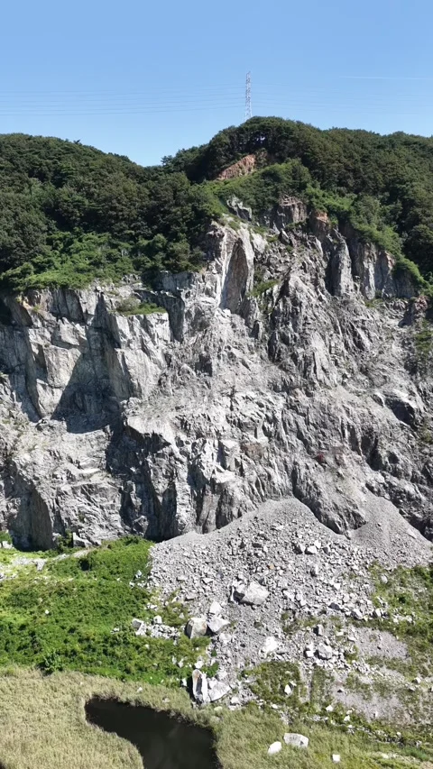 Vertical Drone Flight Over Quarry Cliff – Cinematic Aerial View Stock Footage 320348818