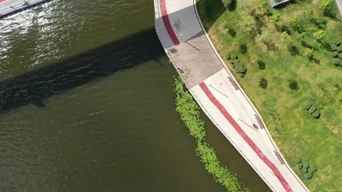 Vertical drone flight over river and promenade Stock Footage 326362221